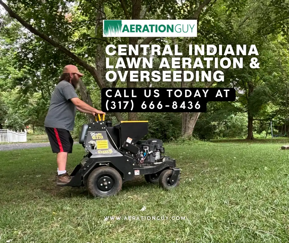 The Aeration Guy technician operating aeration equipment on an Indianapolis residence during a lawn aeration and overseeding service.